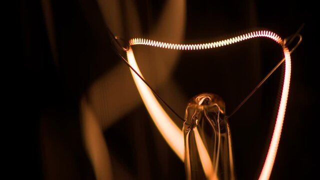 Tungsten Filament is Heated. The filament of the electric bulb changes its brightness due to the voltage drop