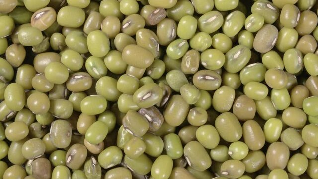 Rotation of mung beans close up. Macro. 4K video. Organic legumes.