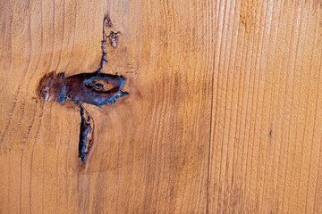 texture of a wooden plate with knot hole