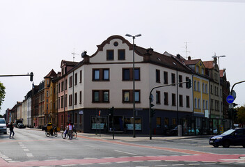 City street with an old building. - 395078748