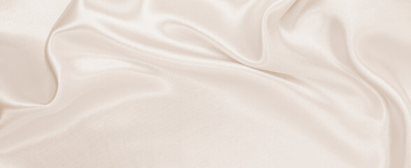  Smooth elegant golden silk or satin luxury cloth texture as wedding background. Luxurious...