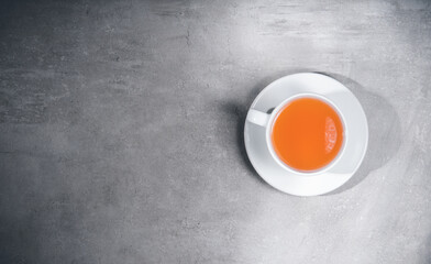 Cup of tea isolated on gray background. Top view, above