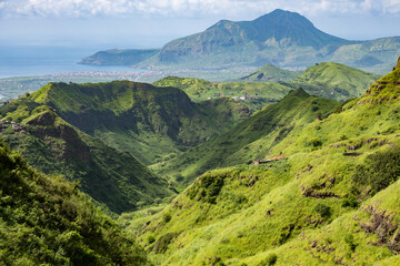 Mountainous green Santiago Island landscape in rain season in Cape Verde - 395085136