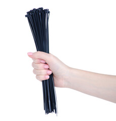 Black plastic ties clamps in hand on white background isolation