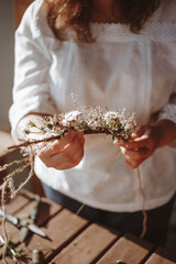 girls hands with flowers