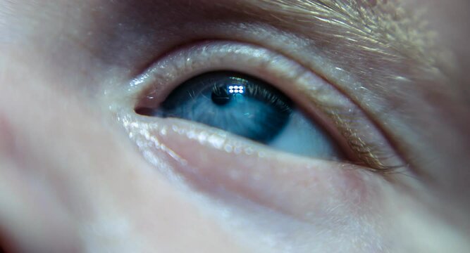 Newborn. Baby's eye close up.