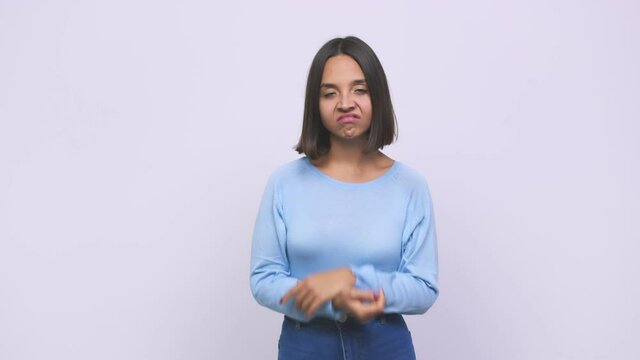Young mixed race woman doubting between two options