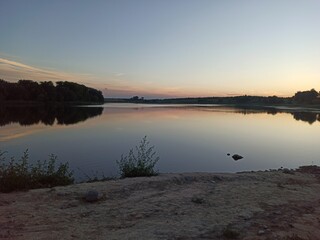 Naklejka premium sunset over lake
