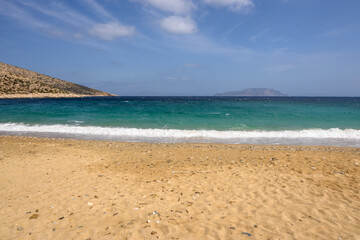 Agia Theodoti beach on Ios Island. A wonderful beach with the golden sand and azure waters. Cyclades, Greece