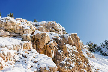 Fototapeta na wymiar Tian Shan mountain system in winter in Uzbekistan. Winter Sunny day