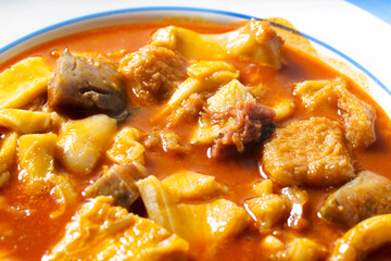beef tripe stew with  red paprika named callos in spain , typical food