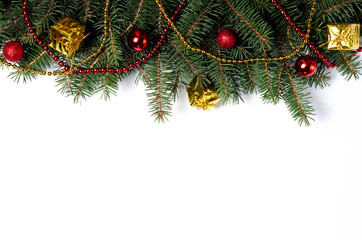 Christmas tree with red and golden decorations on white background. Christmas template. Flat lay concept photo