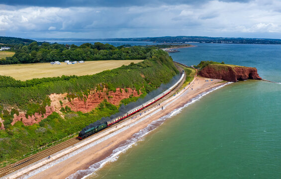 Royal Scot 46100 rounds Langstone Rock with Saphos trains Torbay Express at Dawlish Warren. Taken with a Mavic 2 Pro Hasselblad drone.