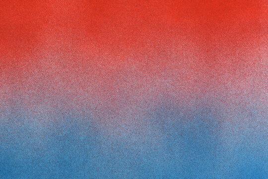 .spray paint gradient from red to blue on a white paper background