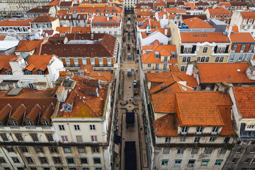 view over the city  the capital of Portugal Lisbon Lisboa buildings with orange rooftops man street 