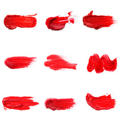 Lipstick smear smudge swatch isolated on white background. Cream makeup texture. Bright red color cosmetic product brush stroke swipe sample