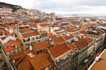 Fototapeta na wymiar view over the capital of Portugal Lisbon Lisboa colorful buildings with orange roofs 