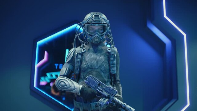 Cyberpunk. Female soldier of future in futuristic combat armor suit in spaceship. Fantastic warrior with assault gun standing against wall illuminated by blue neon light. Steampunk, science fiction