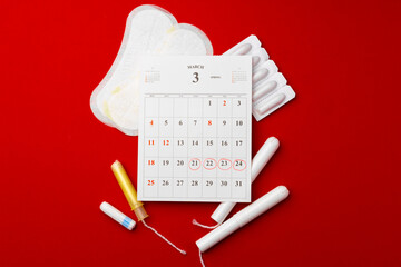 Menstruation calendar with sanitary pads and tampons, pills