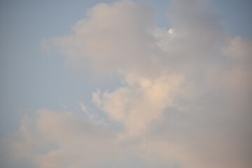 Fototapeta na wymiar Blue sky with puffy white clouds.