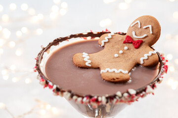 Drunken Gingerbread cookie man in a Christmas cocktail