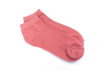 Pair of pink short socks on white background, top view