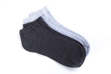 two pairs of colored short socks on a white background, top view