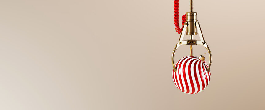 Minimal abstract Merry Christmas for web banner. Red stripe Christmas bauble catch by toy claw machine on beige background. 3d rendering illustration. Clipping path of each element included.