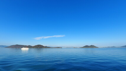 Naklejka premium フェリーからの女木島と男木島1