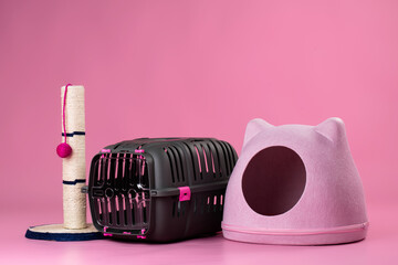 Pet accessories for cats on pink pastel background