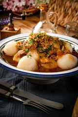 Dumplings with turkey and chorizo sauce.