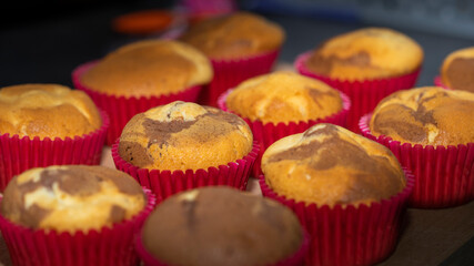 Handmade muffins with butter and chocolate ingredients, brown and yellowish color and delicious taste