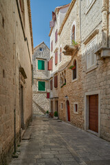 Beautiful city of Trogir, Croatia, narrow streets of the old town	
