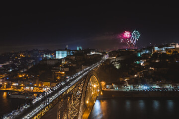 Fototapeta na wymiar new year fireworks in Porto, Portugal, Dom Luis I bridge, Ponte Luis I over Douru river