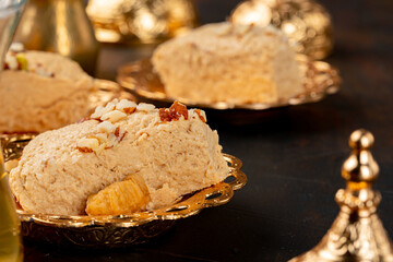 Piece of turkish halva on metal plate