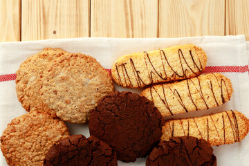 Oat cookies on wooden table close up