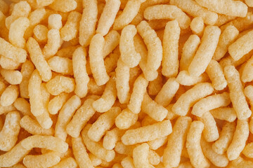 Corn sticks as background texture image. Top view. Place for your text