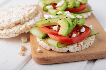 Vegan breakfast rice cake with avocado and tomato