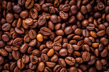 aromatic fresh coffee beans on a white wooden rustic background