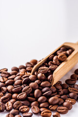 aromatic fresh coffee beans on a white acrylic background