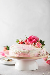 Obraz na płótnie Canvas Birthday party concept with rose white cake