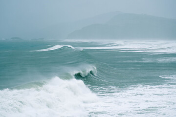 Waves breaking in the ocean during a storm