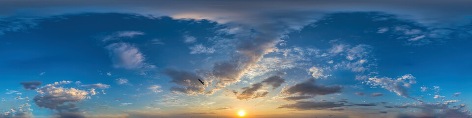 Dark blue sunset sky with clouds Seamless hdr panorama in spherical equirectangular format with complete zenith for use in 3D, game and for composites in aerial drone 360 degree panoramas as sky dome © panophotograph