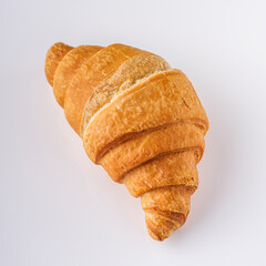 delicious fresh croissant on a white acrylic background