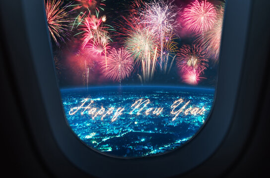 Sparkling Happy New Year Text With Firework In Sky Seen Through Airplane Window During Night