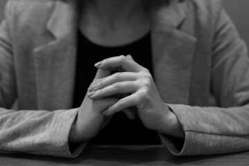 female hands together and jacket