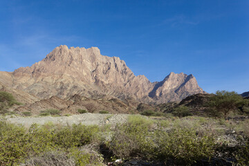 Naklejka na ściany i meble Al Hajar Mountains are the highest mountains in the Arabian Peninsula. Oman . 