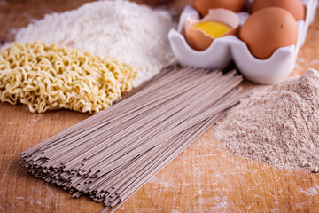 instant egg noodles on a wooden rustic background