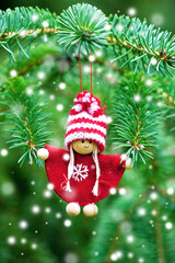 Christmas  fir tree branch background with decorative toy