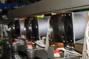 Cooling fans in the pet bottle blowing unit